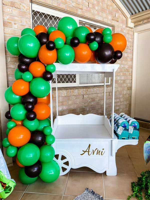 Candy Cart for Child's Birthday Party with jungle themed balloons