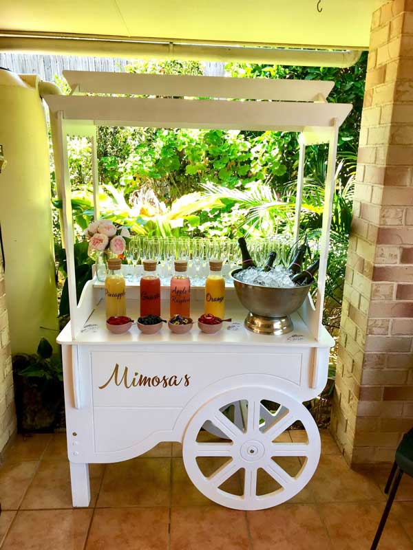 Beautiful drink cart serving mimosas