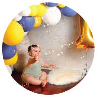 First birthday party with balloons and bubbles